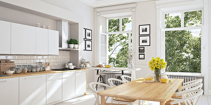 Modern Kitchen With Windows Open and Sun Shining In